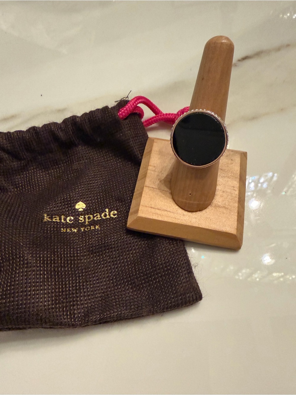 Kate Spade black onyx and rose gold round statement ring